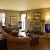 Photo 7: Living room has picture window and hardwood floors.