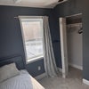 Photo 9: Full size bed and closet