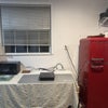 Photo 6: Kitchenette with induction oven, microwave and fridge  