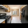 Photo 4: Shared kitchen. The nook area would be your dining area