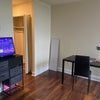 Photo 3: Dresser and TV