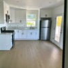 Photo 6: KItchen from Living room view