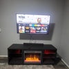 Photo 6: 5p inch tv & Fireplace