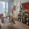 Photo 4: Spacious and cozy living room with 65 inch smart TV and small bistro table
