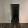 Photo 2: Hall to door. 