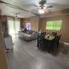 Photo 5: shared dining room and living room area 