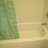 Photo 7: Tub with shower