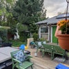 Photo 6: Back deck snd yard- green door leads to bedroom for rent