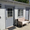 Photo 8: Garage office. Washer/dryer also in here.