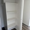 Photo 7: Shelves in master closet