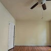 Photo 4: Large enough space to fit a queen bed and desk. Plenty of closet space