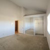 Photo 4: Room with lofted storage 