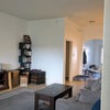 Photo 4: Living room. Most furniture won't be there later. Plenty of space for additional furniture.