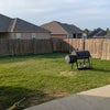 Photo 3: Backyard with access to grill.