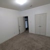 Photo 2: Bedroom 2; More than enough room for bed, desk and dresser.