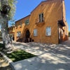 Photo 7: Well maintained property. New driveway & parking lot too