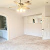 Photo 2: Spacious primary room with lots of windoes