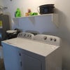 Photo 4: Laundry room and garage 