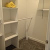 Photo 7: large 5' x 7' closet with storage shelves