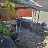 Photo 7: Hot tub and workout equipment
