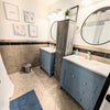 Photo 6: Shared bath w/ individual vanities 