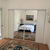 Photo 6: Mirrored closet & portion of bath