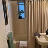 Photo 7: Shared bathroom w window in shower and tub