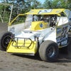 Photo 4: Action at the speedway 
