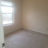 Photo 5: Unfurnished bedroom upstairs