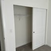 Photo 5: Traditional Sliding closet 