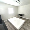 Photo 3: Large Furnished Bedroom