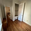 Photo 3: high ceiling gives plenty space in the closet.