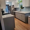 Photo 8: Common Kitchen and laundry area