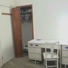 Photo 3: This Furnished Room for Rent (closet, desk)