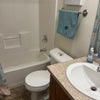 Photo 6:  Bathroom with a shower and bathtub