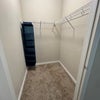 Photo 2: Walk in closet. Organizer there if needed