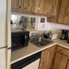 Photo 5: Kitchen with working Refrigarator, microwave, Oven etc