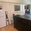 Photo 3: Bedroom with refrigerator,dresser and tv