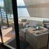 Photo 7: Your downstairs common area deck amazing waterfront view w/ outdoor lounge furniture included
