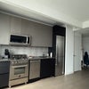 Photo 2: Full kitchen (Microwave, gas stove, dishwasher, oven)