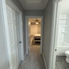 Photo 4: Hallway between bathroom and room