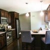 Photo 8: Kitchen (photo is blurry because its from zillow, also has a large kitchen table that is not seen.