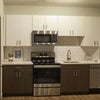 Photo 3: Example kitchen, our kitchen has an additional cabinet and large fridge