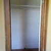 Photo 5: door to the walk-in closet in the room