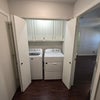 Photo 9: Washer/dryer in hall