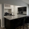 Photo 3: The property features an open kitchen area, perfect for enjoying meal.