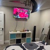 Photo 4: The room includes a modern smart TV with all the top streaming apps and features, plus a side mirror