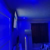Photo 6: The room has customizable mood-lighting, and you can change the light colors straight from your phon