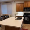 Photo 5: Kitchen Island, Table Seating, Gas Range