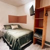 Photo 2: Full size bed with tv 